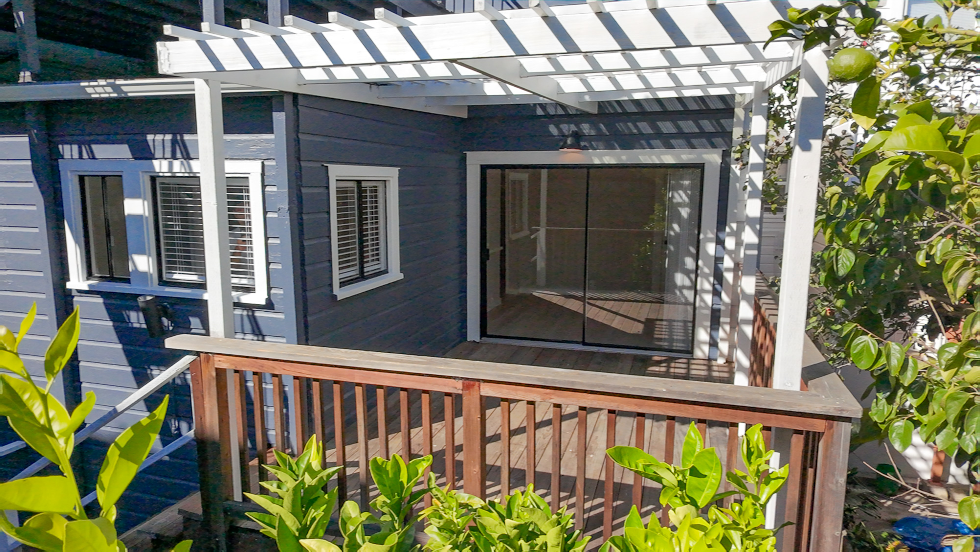 Private deck with an open-air pergola